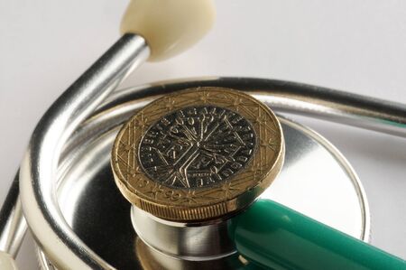 One french euro coin on stethoscopeの写真素材