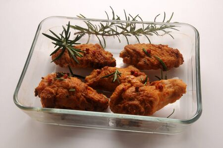 Breaded baked chicken in the baking dishの写真素材