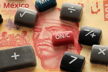 Calculator keys on mexican currencyの写真素材