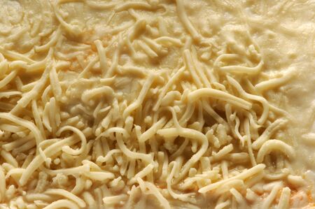 Portion of frozen lasagna before cookingの写真素材