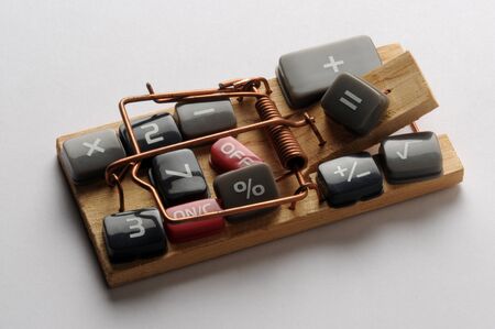 Keys of the electronic calculator on a mousetrapの写真素材