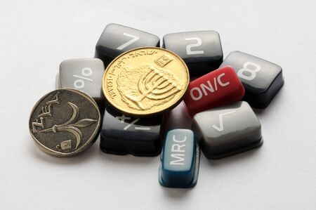 Israeli currency with calculator keysの写真素材