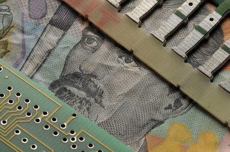Closeup on Romanian banknote with circuit boardの写真素材