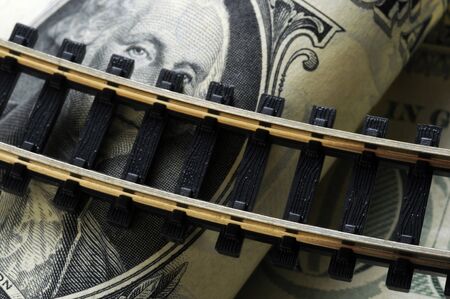 Rail closeup on US banknotesの写真素材