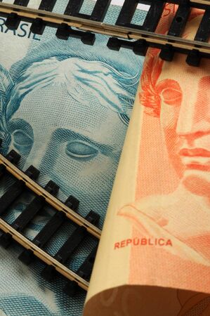 Closeup of rails on brazilian banknotesの写真素材
