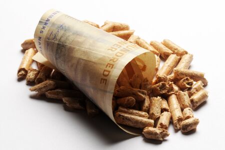 Close up on danish currency with wood pelletsの写真素材