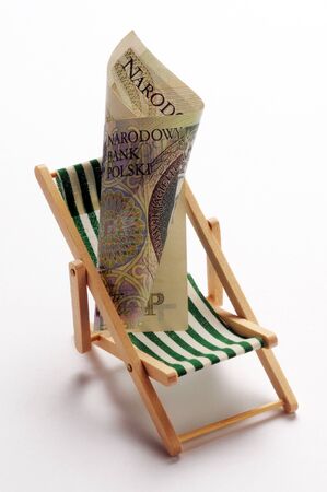 Beach chair with polish currencyの写真素材