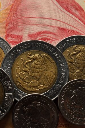 Closeup on mexican banknote and coinsの写真素材