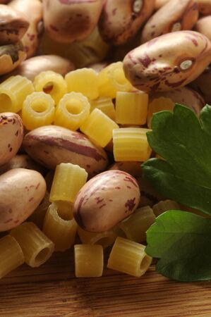 Close up on pasta and raw beansの写真素材