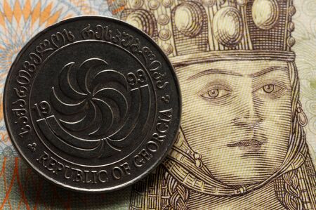 Closeup on Georgian banknote and coinの写真素材