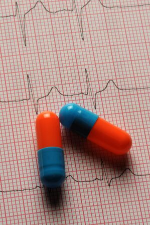 Health analysis chart with pillsの写真素材