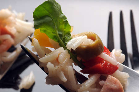 Closeup on rice salad in the forksの写真素材