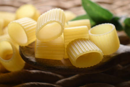 Uncooked Half sleeves striped Italian pastaの写真素材