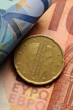 Dutch euro coin on banknotesの写真素材
