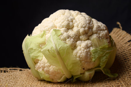 Close up on raw white cauliflower.の写真素材