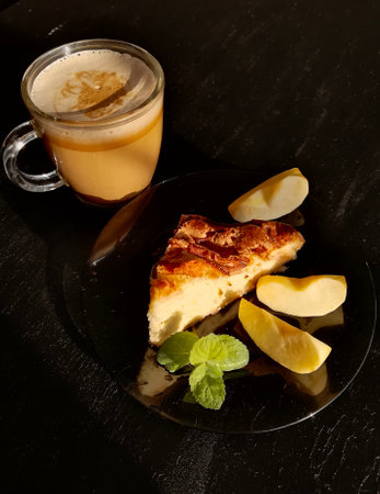 Ð¡up of coffee tea on the table with a homemade cake decorated with a fresh mintの写真素材
