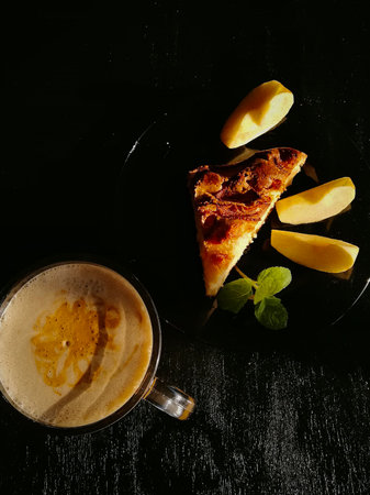 Ð¡up of coffee tea on the table with a homemade cake decorated with a fresh mintの写真素材