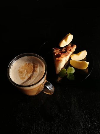 Ð¡up of coffee tea on the table with a homemade cake decorated with a fresh mintの写真素材