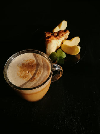 Ð¡up of coffee tea on the table with a homemade cake decorated with a fresh mintの写真素材