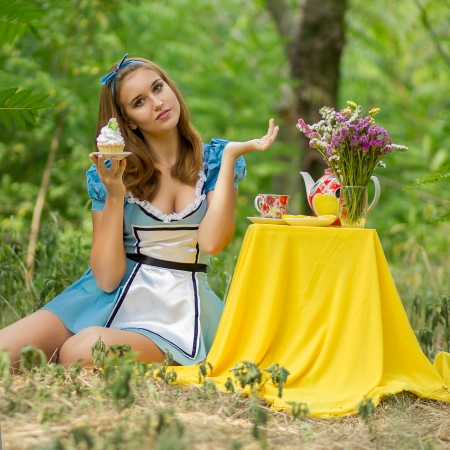 Portrait of beautiful brown-haired girl in a suit of Alice in Wonderlandのeditorial素材