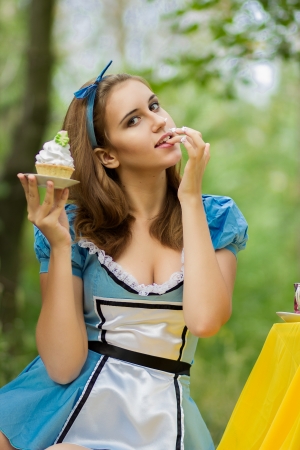 Portrait of beautiful brown-haired girl in a suit of Alice in Wonderlandのeditorial素材