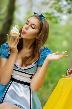 Portrait of beautiful brown-haired girl in a suit of Alice in Wonderlandのeditorial素材