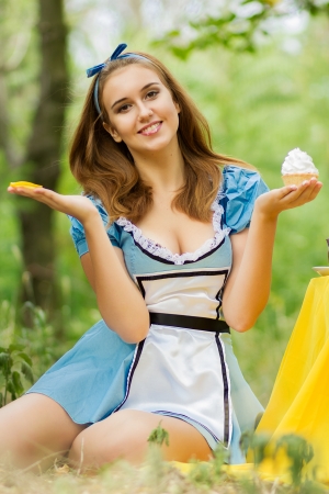 Portrait of beautiful brown-haired girl in a suit of Alice in Wonderlandのeditorial素材
