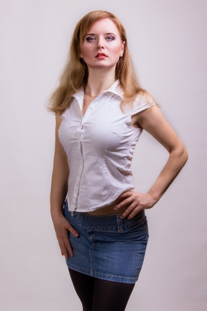 Photographic portrait of a beautiful young woman in studio in the dress with makeupの写真素材