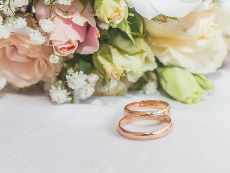 Wedding bouquet and rings. The invitationの写真素材