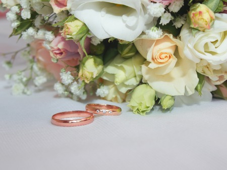 Wedding bouquet and rings. The invitationの写真素材