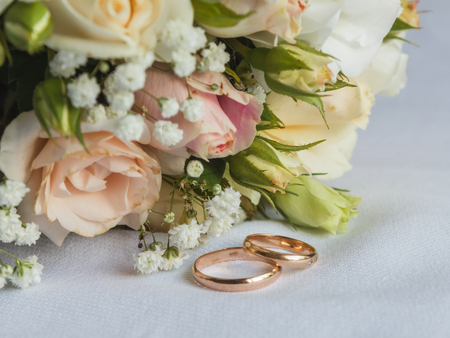 Wedding bouquet and rings. The invitationの写真素材