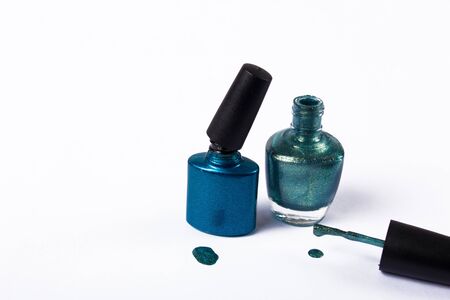 gel Polish for manicure on a white background isolated, with space. Scattered nail Polish in the beauty salon. The choice of color nail Polish for manicure or pedicure.の写真素材