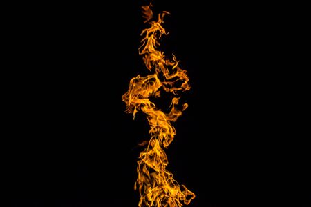 Fire flames on black background. fire on black background isolated. fire patterns.の写真素材