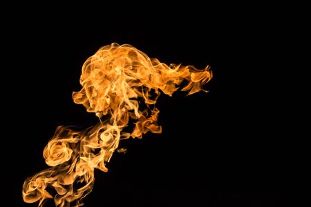 Fire flames on black background. fire on black background isolated. fire patternsの写真素材