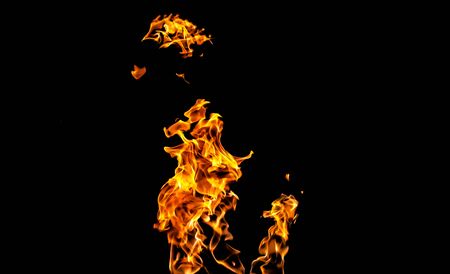 Fire flames on black background. fire on black background isolated. fire patternsの写真素材
