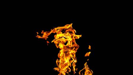 Fire flames on black background. fire on black background isolated. fire patternsの写真素材