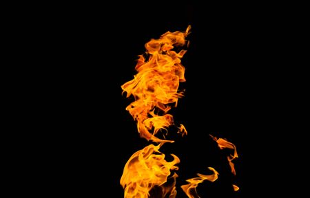 Fire flames on black background. fire on black background isolated. fire patternsの写真素材