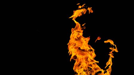 Fire flames on black background. fire on black background isolated. fire patternsの写真素材