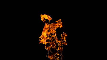 Fire flames on black background. fire on black background isolated. fire patternsの写真素材