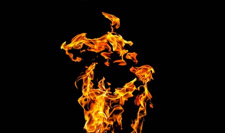 Fire flames on black background. fire on black background isolated. fire patternsの写真素材