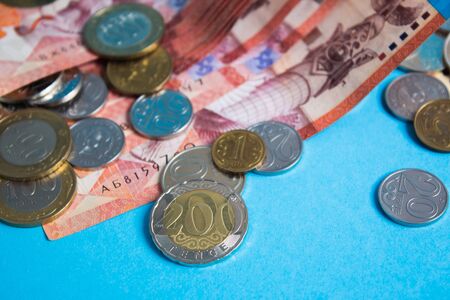 New coin 200 tenge in Kazakhstan. Paper banknotes tenge KZT. Tenge is the national currency of...