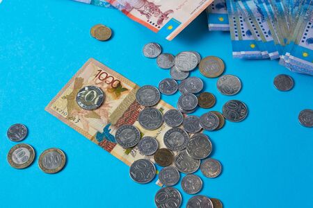 New coin 200 tenge in Kazakhstan. Paper banknotes tenge KZT. Tenge is the national currency of...