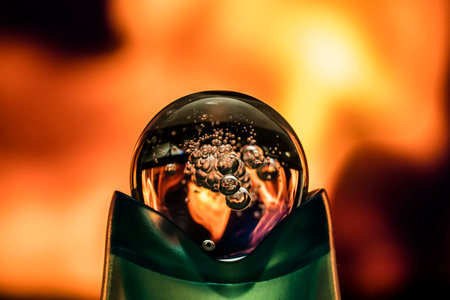 Fireball. The ball is a sphere with the fire of the flame reflected in it. the magic ball is on...
