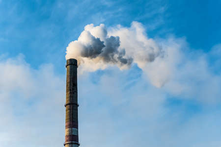 Smoking factory chimneys with co2 emissions.Environmental problem of environmental and air...
