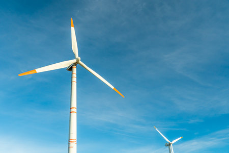 Green energy on wind turbines and wind turbines. Alternative energy sources and renewable energy sources. Power generation and generators of power plants.Wind farm and wind,environmental conservationの写真素材