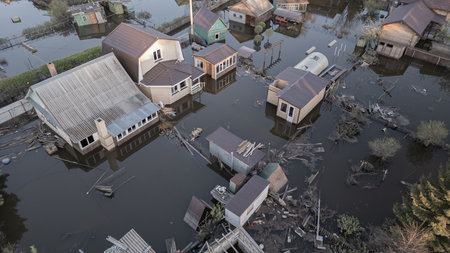 Floods on the planet, global warming. Climate change, natural disasters, the riot of nature. The apocalypse, catastrophes.Storms and destruction.The remnants of human life are floating in dirty water.Endの写真素材