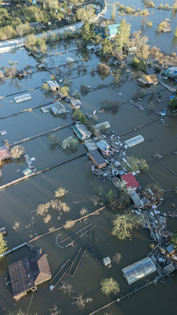 Floods on the planet. The apocalypse, catastrophes. Storms and destruction. Natural disasters, climate change, the riot of nature. The remnants of human life are floating in dirty water. Endの写真素材