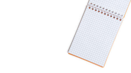 Blank notepad with wire binding isolated on a white background. Top view with copy space.の写真素材