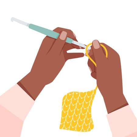 Two dark-skinned female hands crochetingのイラスト素材