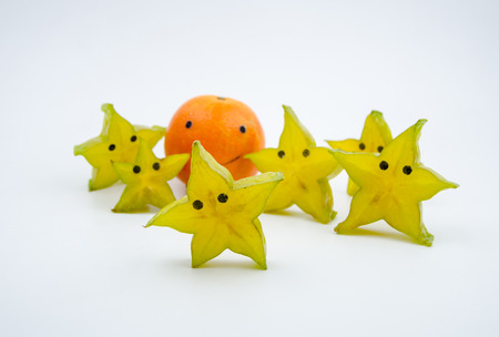 Personification of star fruit and tomatoの写真素材